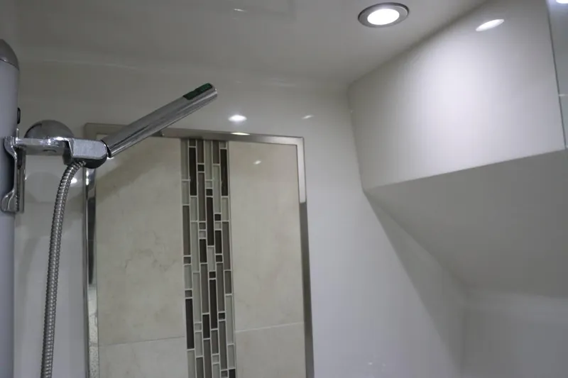 Slide: The Image of Modern shower area in 2014 Marquis 42 Sport Bridge yacht with sleek fixtures. - 34