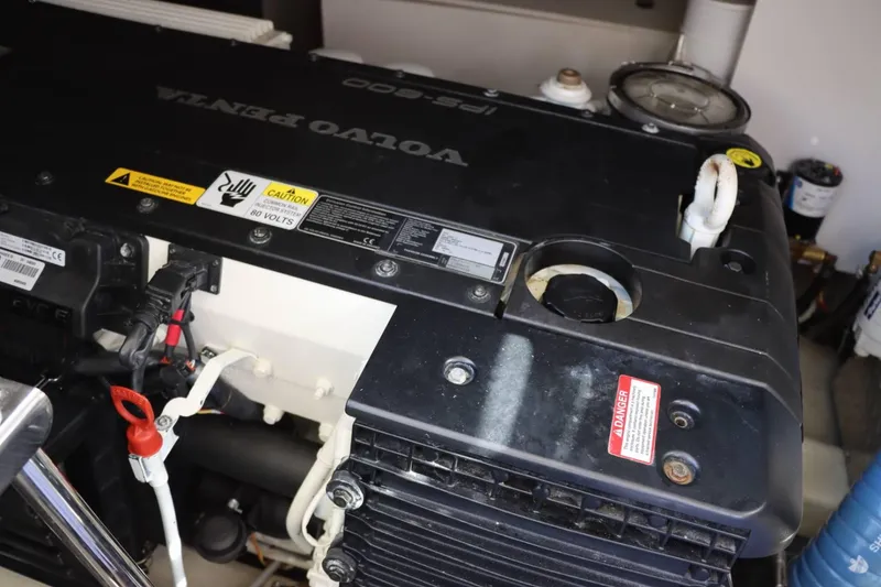Slide: The Image of Engine compartment of a 2014 Marquis 42 Sport Bridge with Volvo Penta IPS-600. - 49