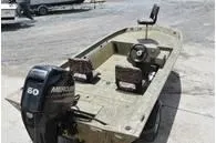 Slide: The Image of 2024 Tracker Grizzly 1754 SC boat with Mercury 60 HP outboard motor. - 4