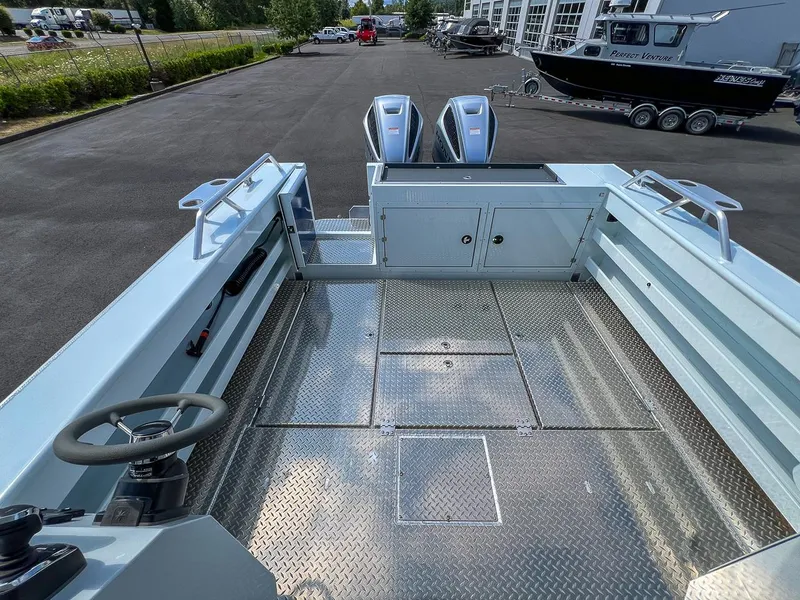 Slide: The Image of 2022 Hewescraft 290 Adventure boat deck with dual outboard motors. - 19