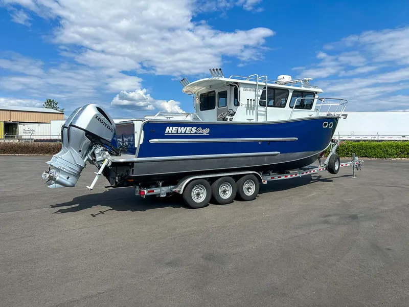 Slide: The Image of 2022 Hewescraft 290 Adventure boat on a trailer with Honda outboard motor. - 3