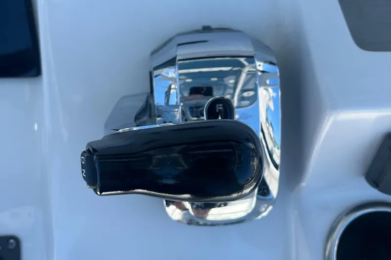 Slide: The Image of Close-up of throttle control on 2019 Sea Pro 239 Center Console boat. - 12