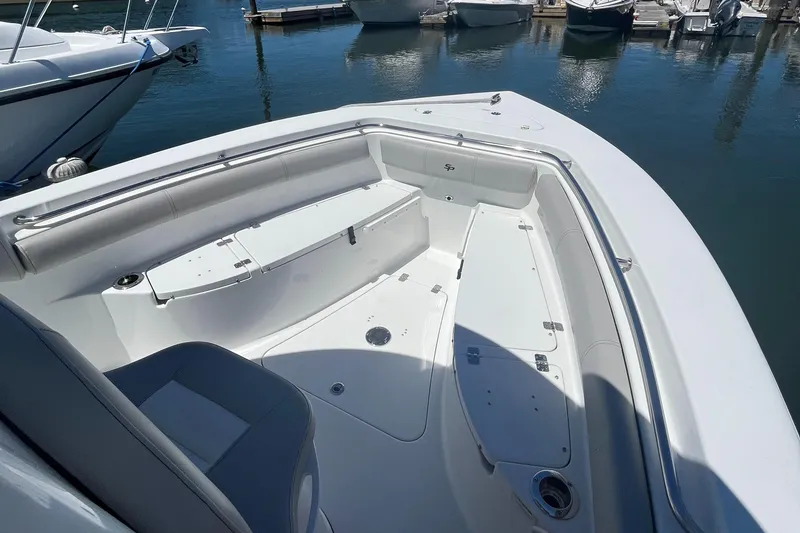 Slide: The Image of 2019 Sea Pro 239 Center Console boat with spacious seating and storage at the bow. - 26