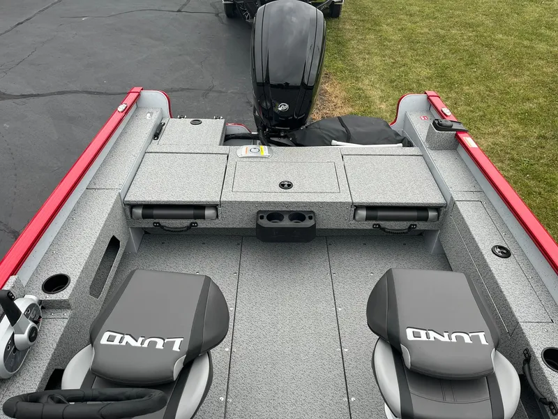 Slide: The Image of 2025 Lund 1675 Adventure SS boat interior with seating and storage compartments. - 10