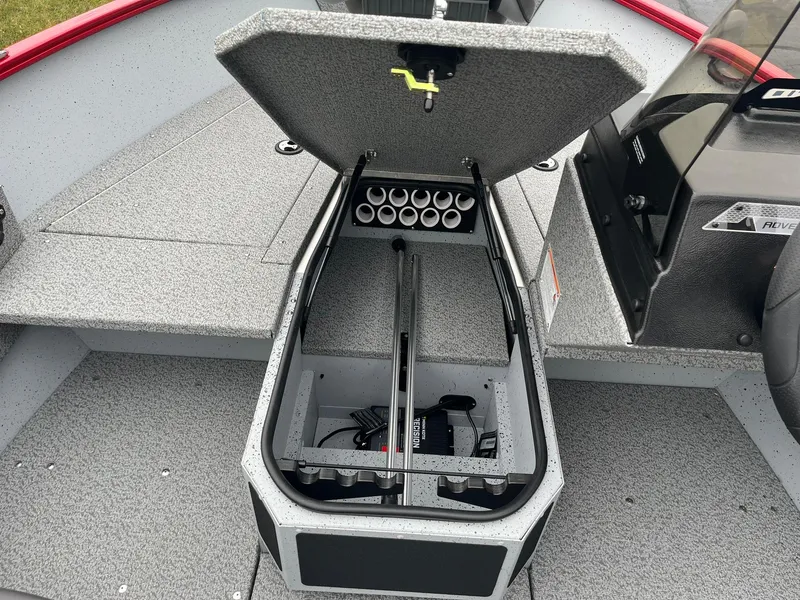 Slide: The Image of 2025 Lund 1675 Adventure SS boat interior with open storage compartment. - 8