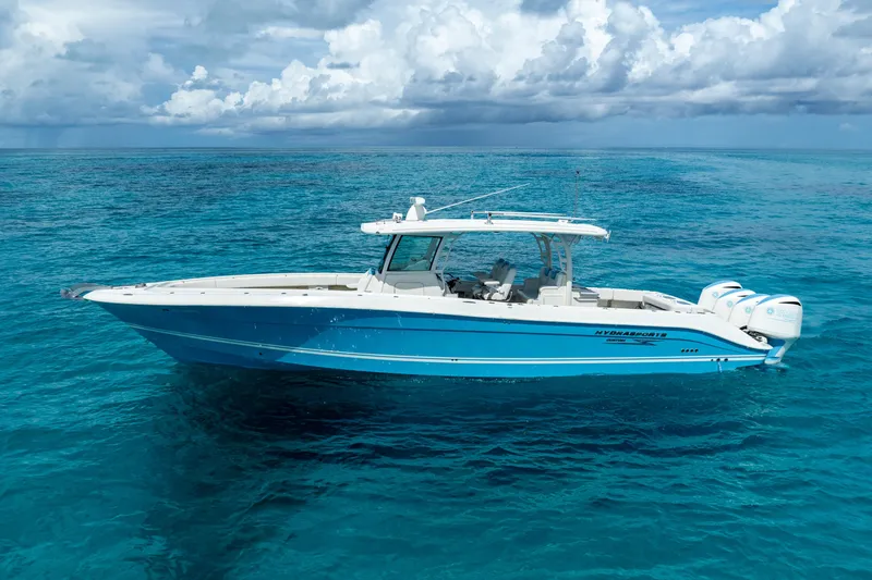 Slide: The Image of 2018 Hydra-Sports 4200 Siesta boat on clear blue ocean water. - 0