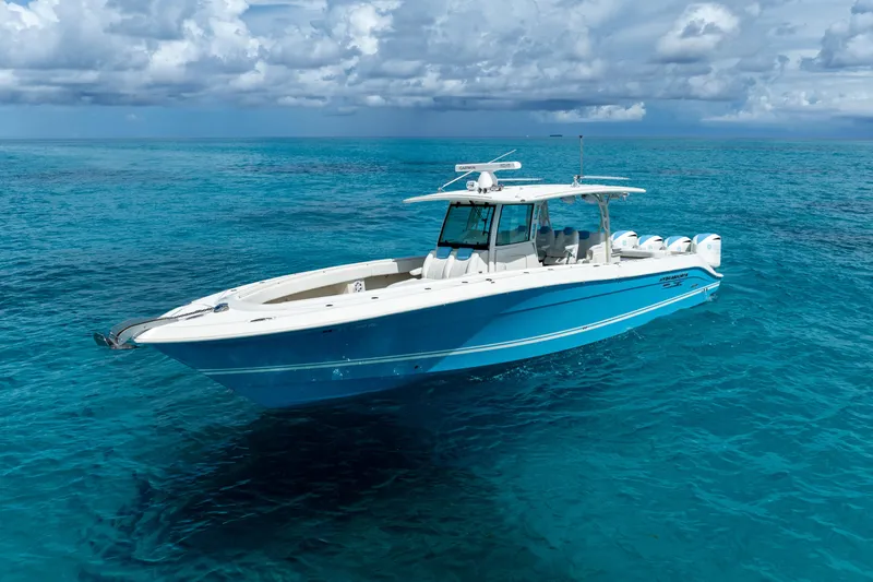 Slide: The Image of 2018 Hydra-Sports 4200 Siesta boat on clear blue ocean water. - 1