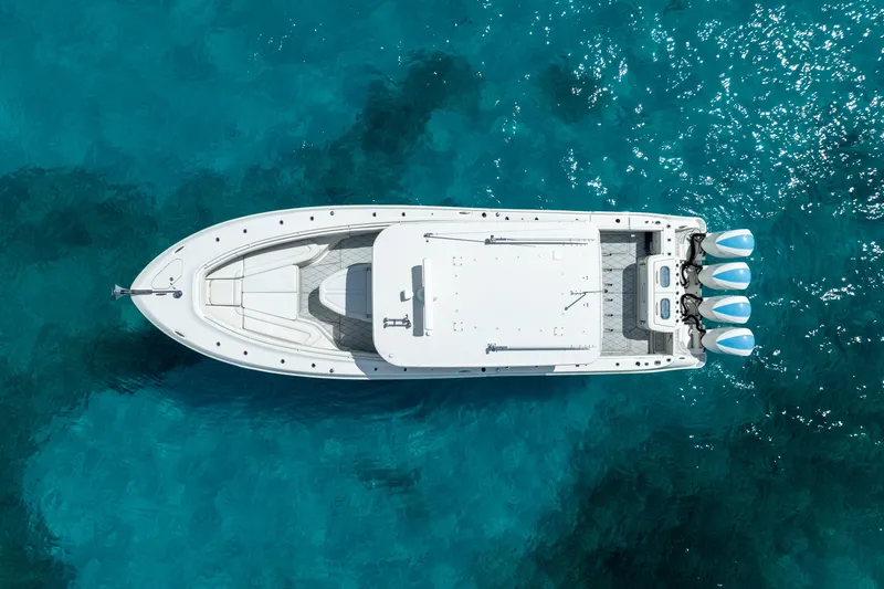 Slide: The Image of Aerial view of 2018 Hydra-Sports 4200 Siesta boat on clear blue water. - 11