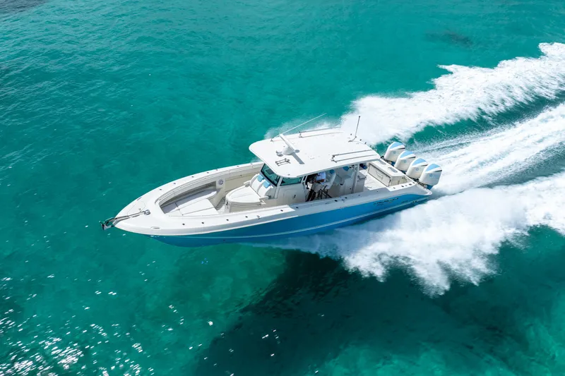 Slide: The Image of 2018 Hydra-Sports 4200 Siesta cruising on clear turquoise waters. - 14