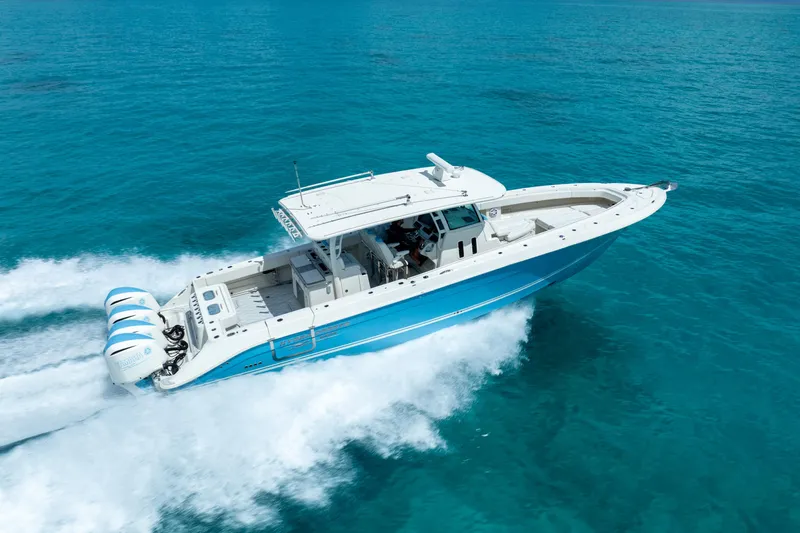 Slide: The Image of 2018 Hydra-Sports 4200 Siesta boat cruising on clear blue water. - 16
