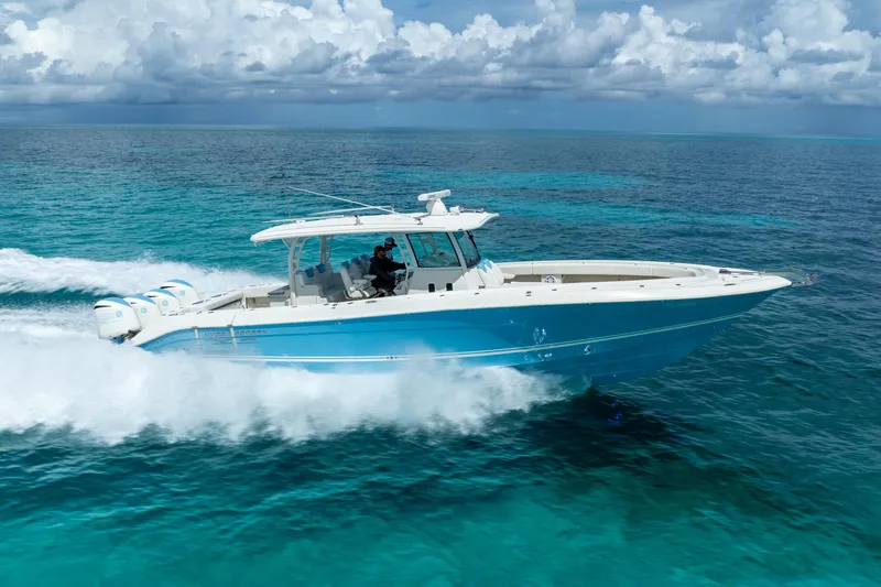 Slide: The Image of 2018 Hydra-Sports 4200 Siesta boat cruising on clear blue ocean water. - 17