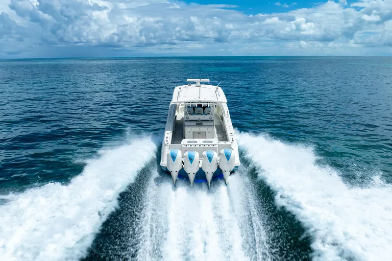 Slide: The Image of 2018 Hydra-Sports 4200 Siesta boat speeding on open water. - 19