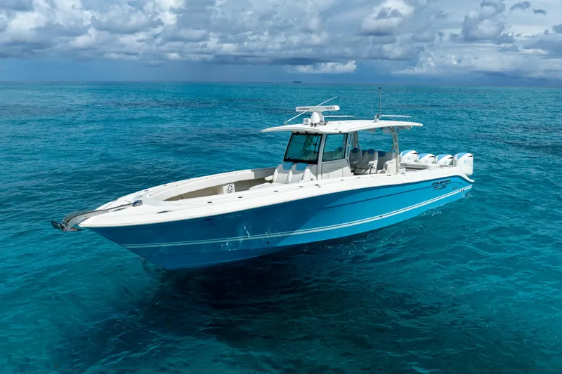 Slide: The Image of 2018 Hydra-Sports 4200 Siesta boat on clear blue ocean water. - 2
