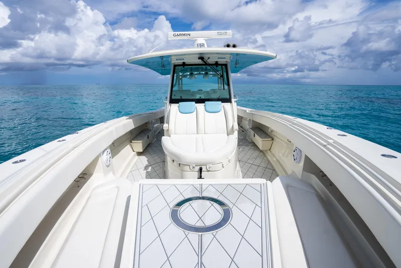 Slide: The Image of 2018 Hydra-Sports 4200 Siesta boat on clear blue ocean water. - 21