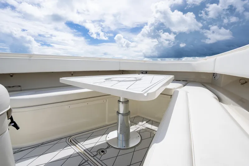 Slide: The Image of 2018 Hydra-Sports 4200 Siesta boat interior with seating and table. - 25