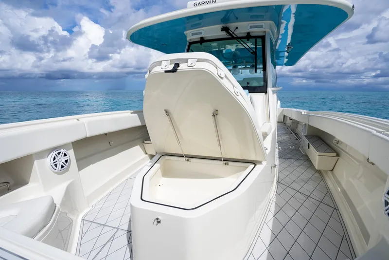 Slide: The Image of 2018 Hydra-Sports 4200 Siesta boat with open storage compartment on deck. - 26