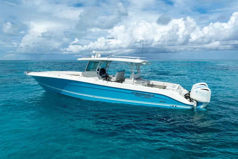 Slide: The Image of 2018 Hydra-Sports 4200 Siesta boat on clear blue ocean water. - 3
