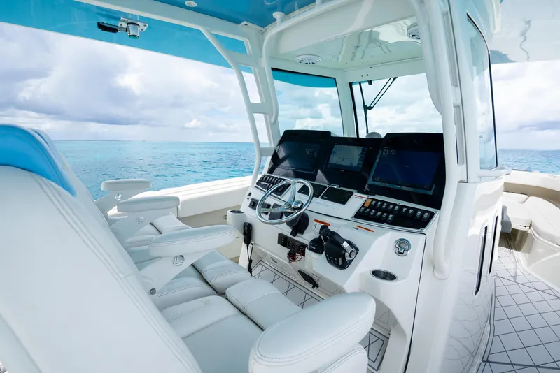 Slide: The Image of 2018 Hydra-Sports 4200 Siesta boat cockpit with ocean view. - 30