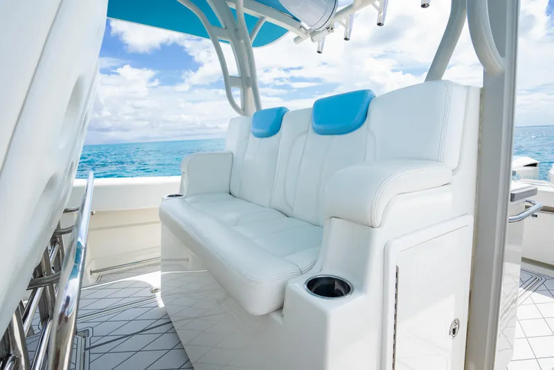 Slide: The Image of 2018 Hydra-Sports 4200 Siesta boat with white leather seating and ocean view. - 35