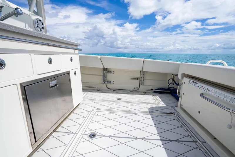 Slide: The Image of 2018 Hydra-Sports 4200 Siesta boat deck with ocean view and storage compartments. - 43