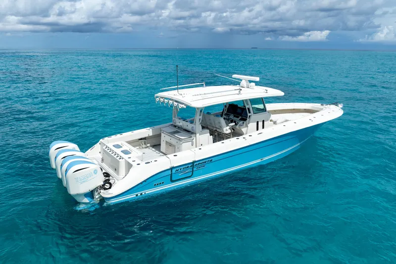 Slide: The Image of 2018 Hydra-Sports 4200 Siesta boat on clear blue ocean water. - 6