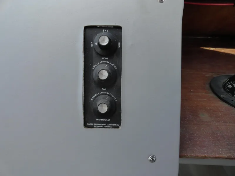 Slide: The Image of Control panel of a 1996 Hallett Party Cruiser Gull Wing 300 boat. - 14