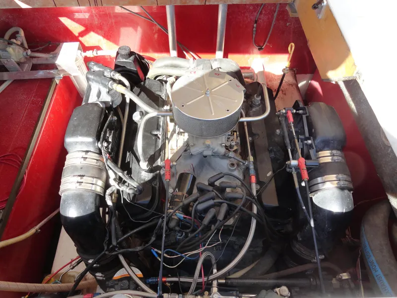Slide: The Image of Engine compartment of a 1996 Hallett Party Cruiser Gull Wing 300 boat. - 23