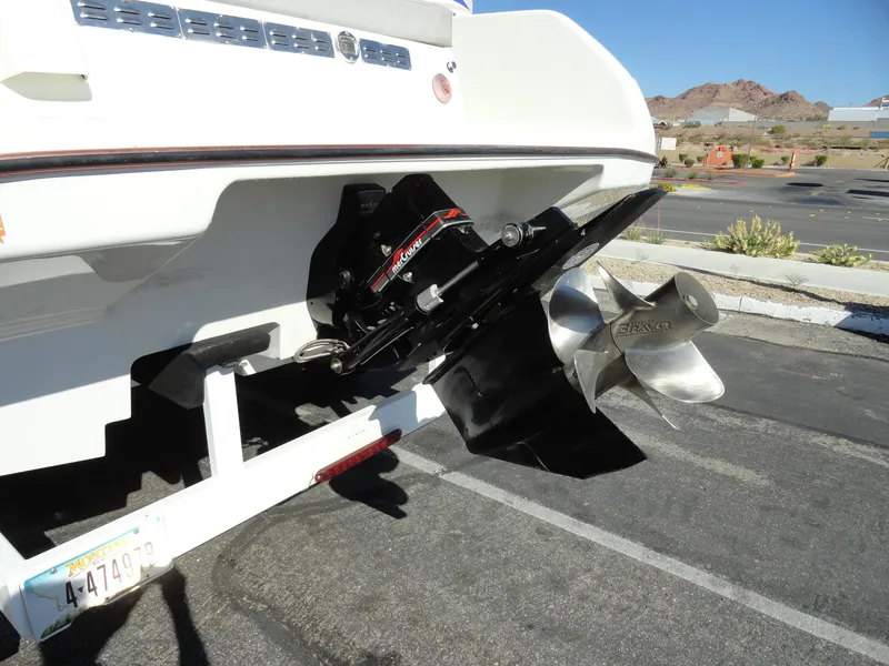 Slide: The Image of 1996 Hallett Party Cruiser Gull Wing 300 boat propeller and stern drive. - 27