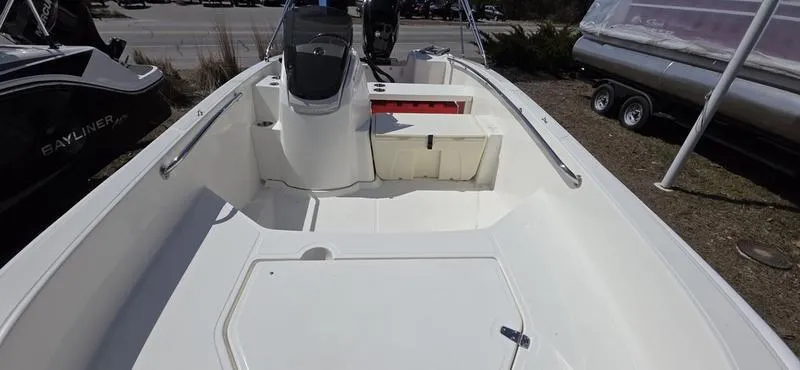 Slide: The Image of 2025 Boston Whaler 160 Super Sport boat interior, showcasing spacious seating and sleek design. - 7