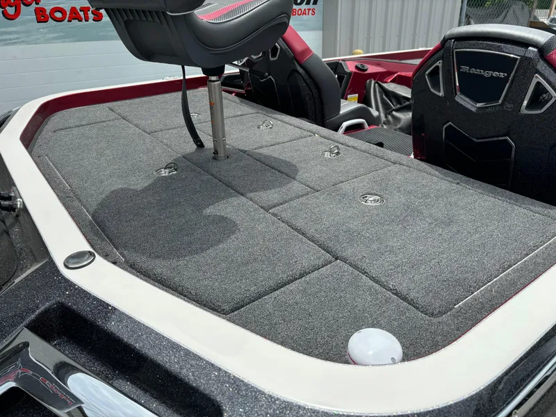 Slide: The Image of 2025 Ranger Z521R boat deck with seating and storage compartments. - 11