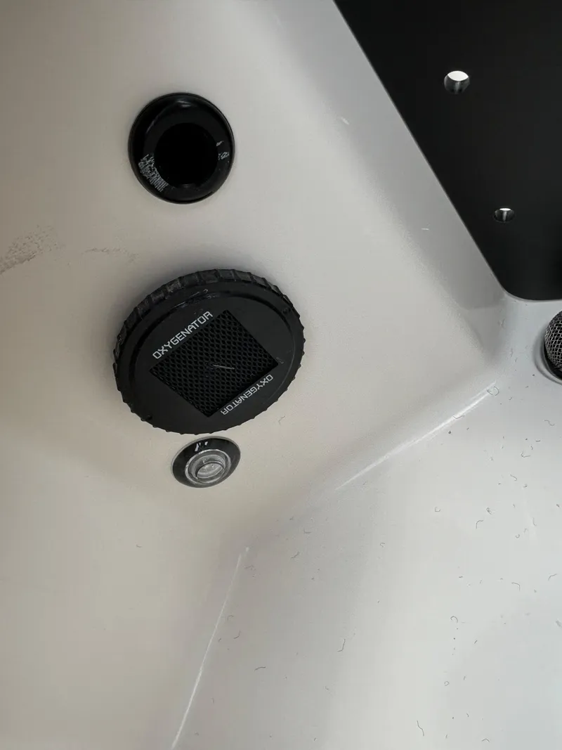 Slide: The Image of Close-up of 2025 Ranger Z521R boat interior components. - 13