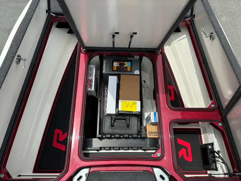 Slide: The Image of 2025 Ranger Z521R boat storage compartments with various equipment and accessories. - 5
