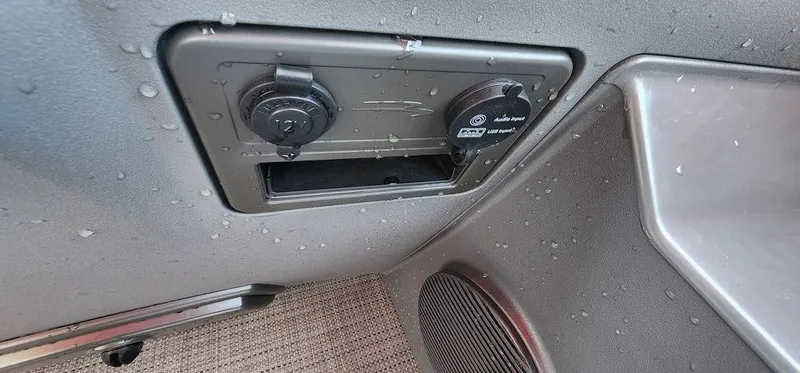 Slide: The Image of 2024 Bennington 20 SVF boat interior with wet surfaces and speaker detail. - 18