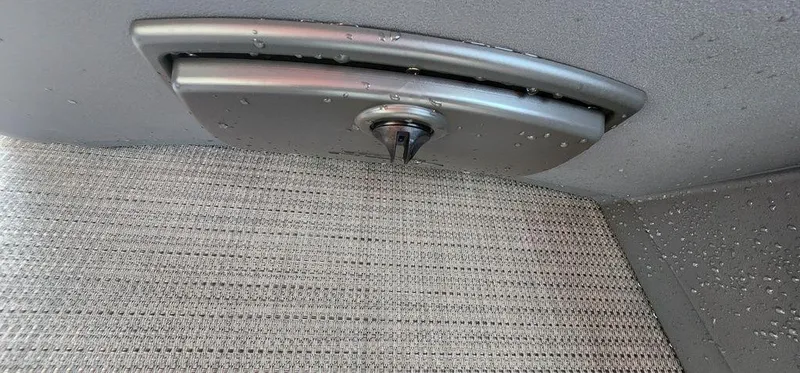 Slide: The Image of 2024 Bennington 20 SVF boat interior detail with water droplets. - 20