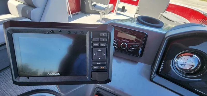 Slide: The Image of 2024 Bennington 20 SVF boat dashboard with Garmin navigation system. - 24