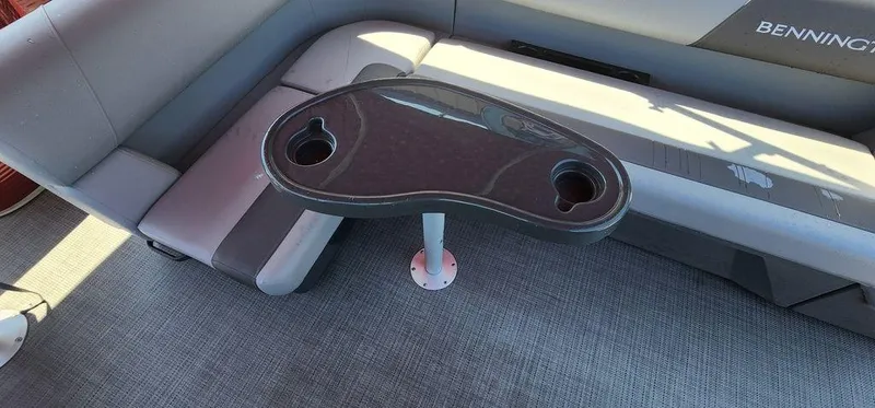 Slide: The Image of 2024 Bennington 20 SVF boat interior with seating and table. - 25