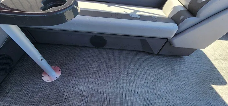 Slide: The Image of 2024 Bennington 20 SVF boat interior with gray seating and flooring. - 26
