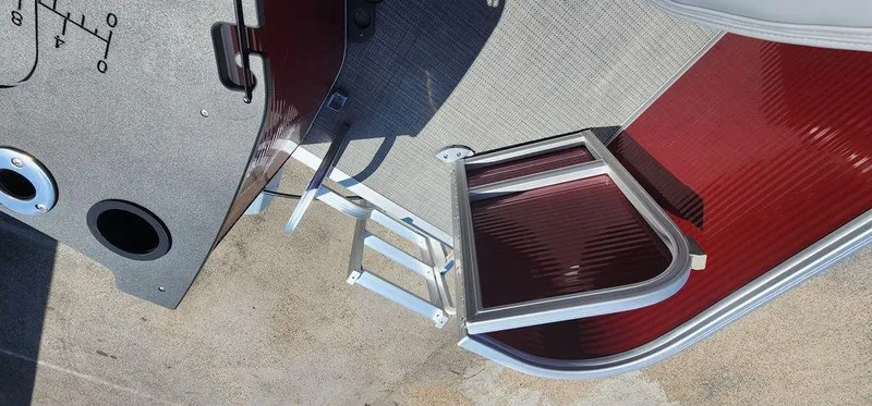 Slide: The Image of 2024 Bennington 20 SVF boat interior with open hatch and ladder. - 27