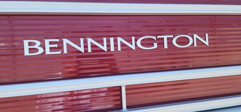 Slide: The Image of 2024 Bennington 20 SVF boat with red exterior and white lettering. - 5