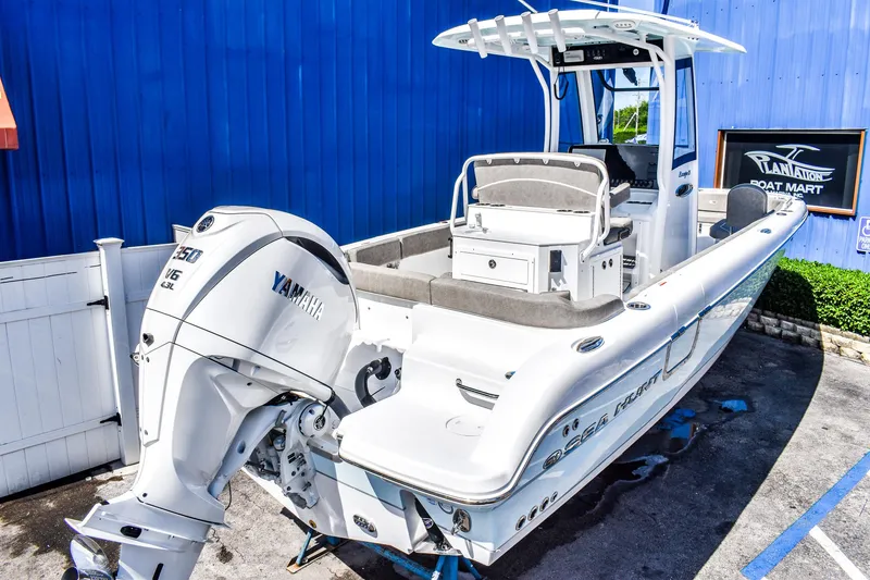 Slide: The Image of 2025 Sea Hunt Escape 25 boat with Yamaha outboard motor. - 1