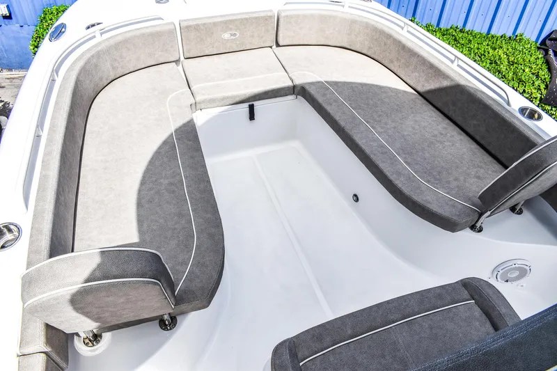 Slide: The Image of 2025 Sea Hunt Escape 25 boat with spacious seating area. - 11