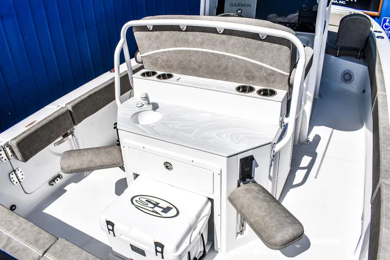 Slide: The Image of 2025 Sea Hunt Escape 25 boat interior with seating and storage compartments. - 5