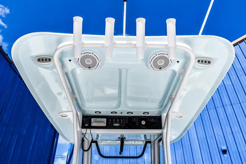 Slide: The Image of 2025 Sea Hunt Escape 25 boat top view with speakers and rod holders. - 6