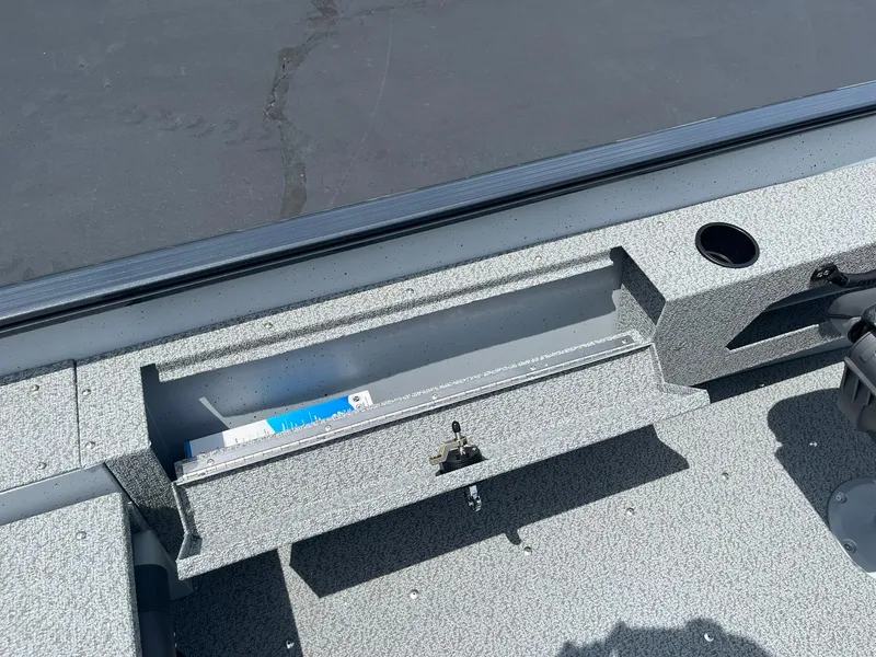 Slide: The Image of 2025 Lund 1775 Adventure SS boat interior storage compartment. - 17