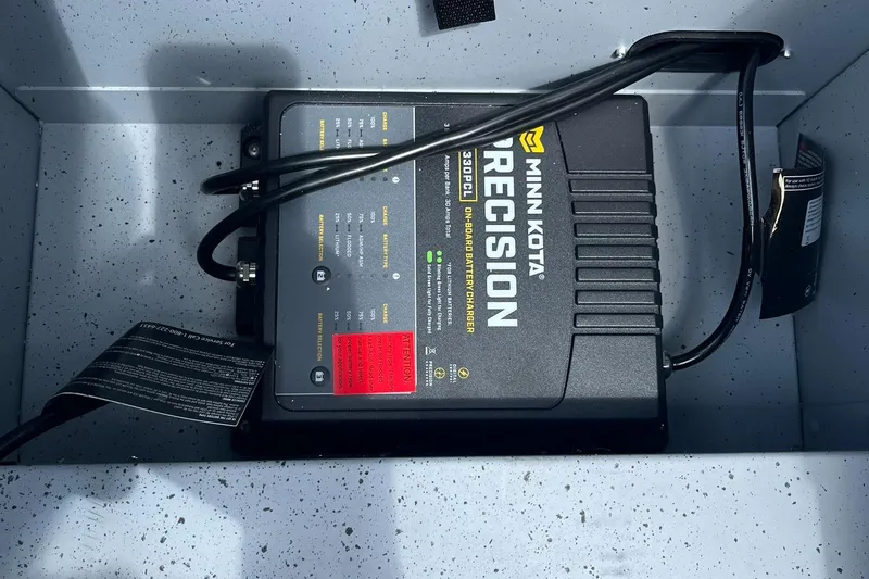 Slide: The Image of Minn Kota Precision charger in 2025 Lund 1775 Adventure SS boat. - 21