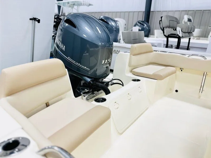 Slide: The Image of 2025 Scout 195 Sportfish boat interior with Yamaha 115 outboard motor. - 11