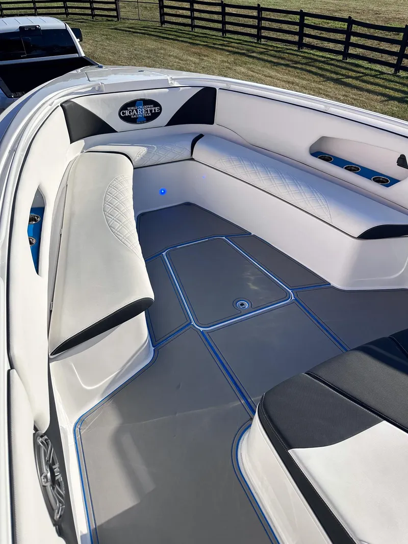 Slide: The Image of 2021 Cigarette 39 GTS boat interior with white and black seating. - 7