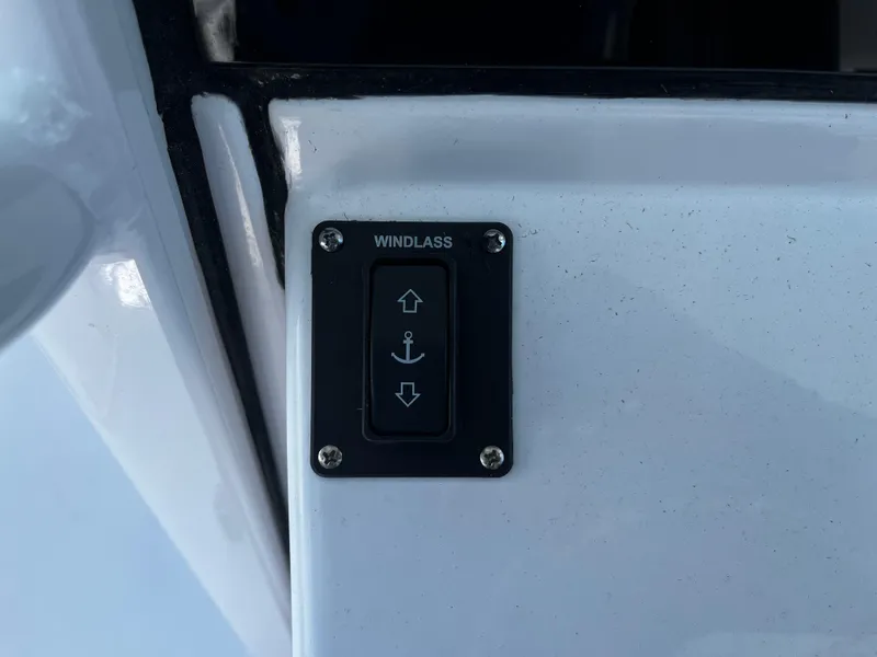Slide: The Image of 2024 Sportsman 322 OPEN CC windlass control switch. - 13