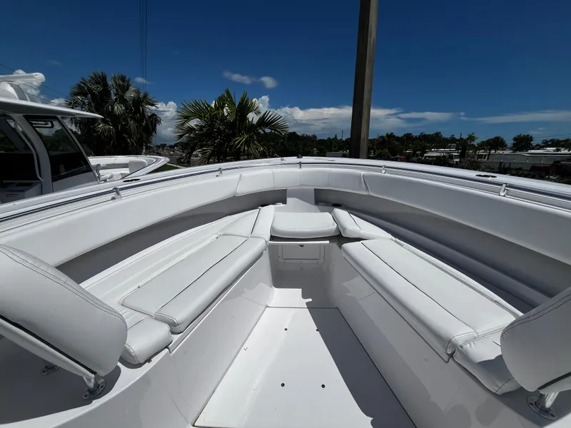 Slide: The Image of 2024 Sportsman 322 OPEN CC boat with spacious seating and sleek design. - 19