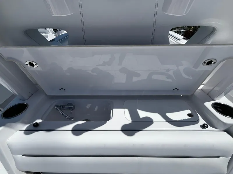 Slide: The Image of 2024 Sportsman 322 OPEN CC boat interior storage compartment. - 8